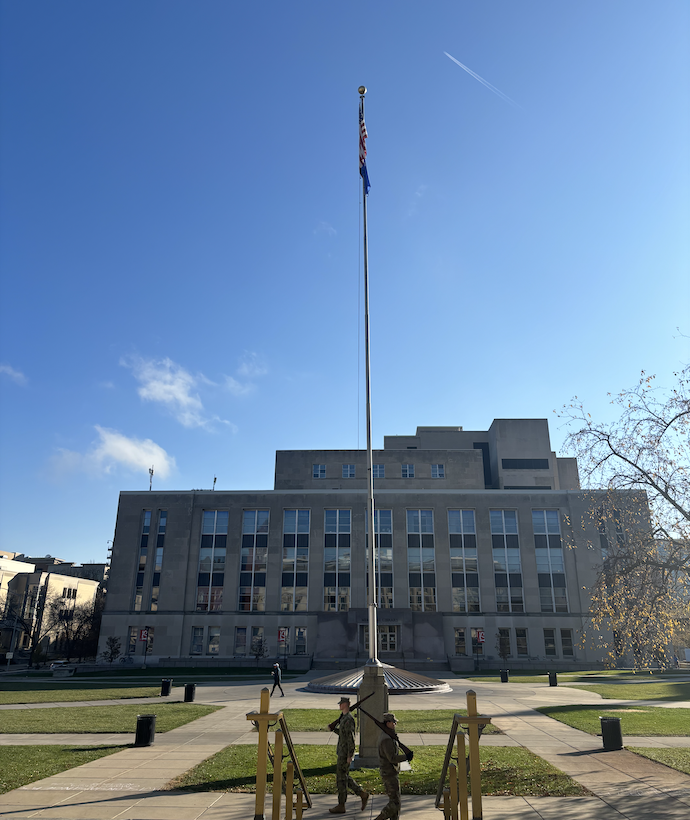 ROTC members in front of the U.S. flag on Library Mall.